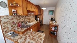 an overhead view of a kitchen with a sink at GITE LE HOLWECK Gérardmer in Gérardmer