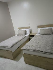 Postel nebo postele na pokoji v ubytování Nový velký apartmán centrum Sheraton, Hurghada