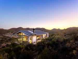a house with a view of the mountains at LANDRANI Luxury Self-catering Accommodation in Oudtshoorn