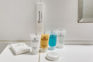 a group of products sitting on a bathroom counter at 820 Suite Libellule - Superb apartment in Les Lilas