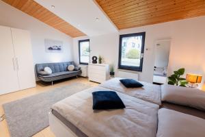 Postel nebo postele na pokoji v ubytování Racing-Chalet (Ferienhaus)