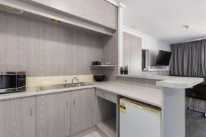 Kuchyň nebo kuchyňský kout v ubytování Comfort Inn Glenelg