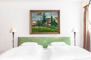 Postelja oz. postelje v sobi nastanitve Schlossberghotel