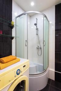 Koupelna v ubytování Апартаменты возле метро Ботанический сад