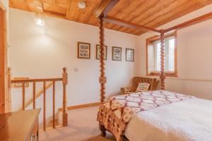 Postel nebo postele na pokoji v ubytování Millrace Cottage