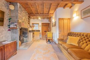 Kuchyň nebo kuchyňský kout v ubytování Millrace Cottage