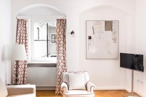 TV in/ali zabaviščno središče v nastanitvi Schlossberghotel