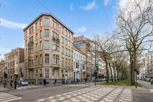 a city street with buildings and a crosswalk at The Workspace w/Free Parking in Antwerp