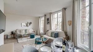 Et opholdsområde på 155 Suite Georges - Superb apartment in Paris