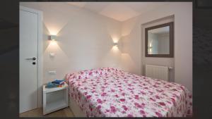 Postel nebo postele na pokoji v ubytování Adria Apartments