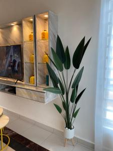 TV a/nebo společenská místnost v ubytování Single storey bungalow Tangkak