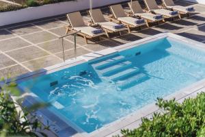 The swimming pool at or close to Lindos Village Resort & Spa - Adults Only