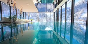 The swimming pool at or close to Alpin Life Resort Lürzerhof