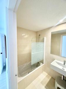 a bathroom with a shower and a sink at SEA VIEW & BEACH ACCESS - Center - Parking in Marbella