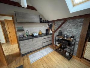 Kuchyň nebo kuchyňský kout v ubytování Pension Petersohn (ehem. Zur Heimat)