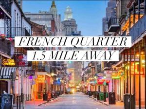 a street in a city with the words french quarter miles away at Central City Charm in New Orleans