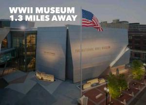 a building with an american flag and the words wii museum miles away at Central City Charm in New Orleans