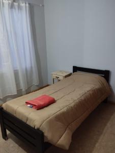 En eller flere senge i et værelse på DUPLEX CENTRICO