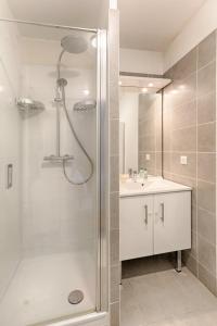a bathroom with a shower and a sink at Resident- Beautiful 6P apartment in Montrouge