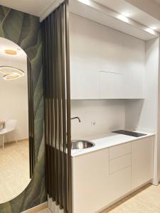 Baðherbergi á Astoria Suite Hotel