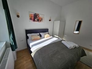Postel nebo postele na pokoji v ubytování Cozy And Quit 1170 Vienna