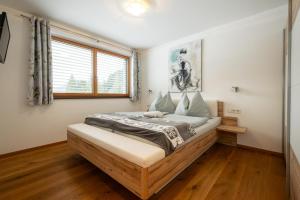 Postel nebo postele na pokoji v ubytování Ferienwohnung Hinterlehen