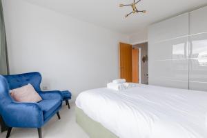 Ένα ή περισσότερα κρεβάτια σε δωμάτιο στο Chic Cosy & Well-Connected 1BD Flat Bermondsey!