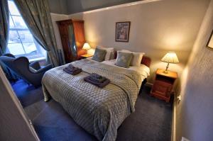 Postel nebo postele na pokoji v ubytování Burnside Guest House