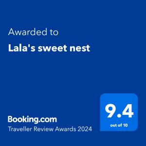 a blue text box with the words awarded to lallas sweet nest at Lala's sweet nest in Călimăneşti