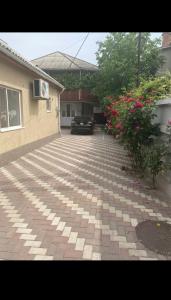a brick driveway with a car parked in a house at Relax House Downtown !!! in Bălţi