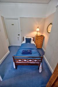Postel nebo postele na pokoji v ubytování Burnside Guest House