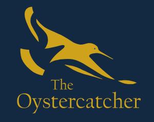 un logotipo para el santuario de aves okefenokee en The Oystercatcher Lodge Guest House en Carlingford