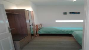 Posteľ alebo postele v izbe v ubytovaní Apartment Šulić + 35 fotografií