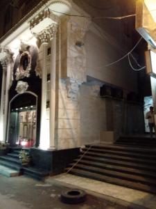 a building with stairs in front of a building at night holiday in in Alexandria