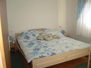 Postel nebo postele na pokoji v ubytování Apartment Park Crni Lug