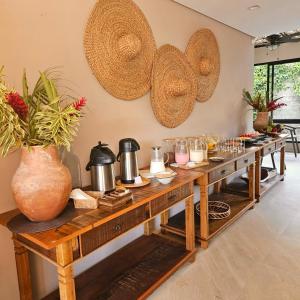 Um restaurante ou outro lugar para comer em Pousada Yamandu - Piscinas Aquecidas