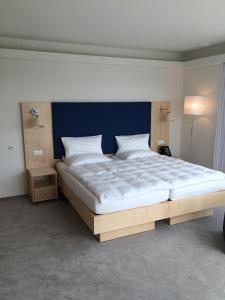 Posteľ alebo postele v izbe v ubytovaní Hotel Erwin Junker