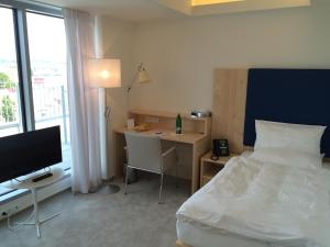 Posteľ alebo postele v izbe v ubytovaní Hotel Erwin Junker