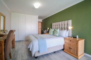 Postel nebo postele na pokoji v ubytování Belle Vue Ridge BnB,