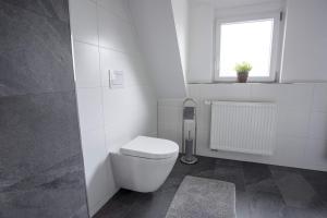 Ein Badezimmer in der Unterkunft Claudias Apartment - 20 Minuten bis Messe Nürnberg