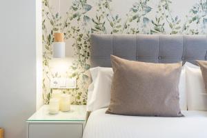 Postel nebo postele na pokoji v ubytování La Cala Beach by ELE Apartments