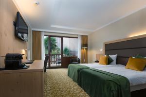 Postel nebo postele na pokoji v ubytování Hotel Restaurant Van Der Valk Nivelles-Sud