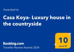 Certifikat, nagrada, logo ili neki drugi dokument izložen u objektu Casa Koya- Luxury house in the countryside