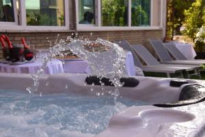 The swimming pool at or close to HOTEL CONTI