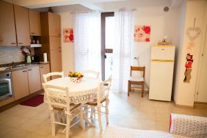Kuchyň nebo kuchyňský kout v ubytování B&B Flower House