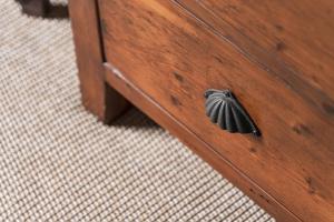 a wooden drawer with a black object on it at Bryony Cottage: Close to Station in Windermere