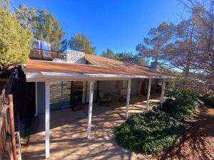 a pavilion with a roof on top of a house at Harmony House Homestay in Sedona