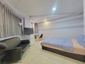 TV a/nebo společenská místnost v ubytování Good Fit Homestay
