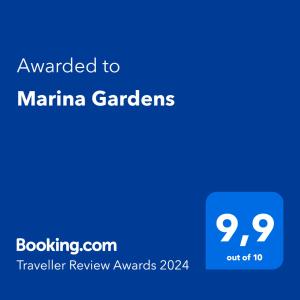 a blue text box with the words awarded to marina gardens at Marina Gardens in Paphos