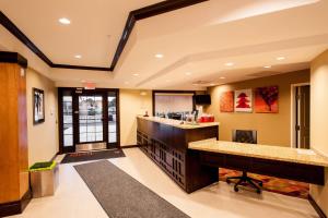a large lobby with a counter in a room at TownePlace Suites by Marriott Roswell in Roswell